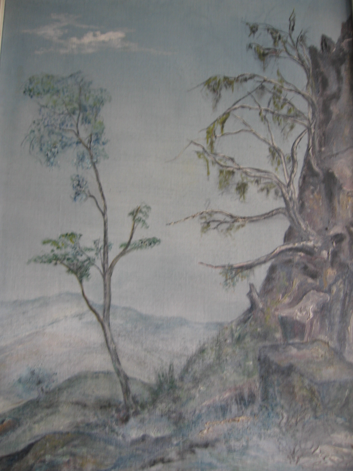 a painting of a tree on a wall