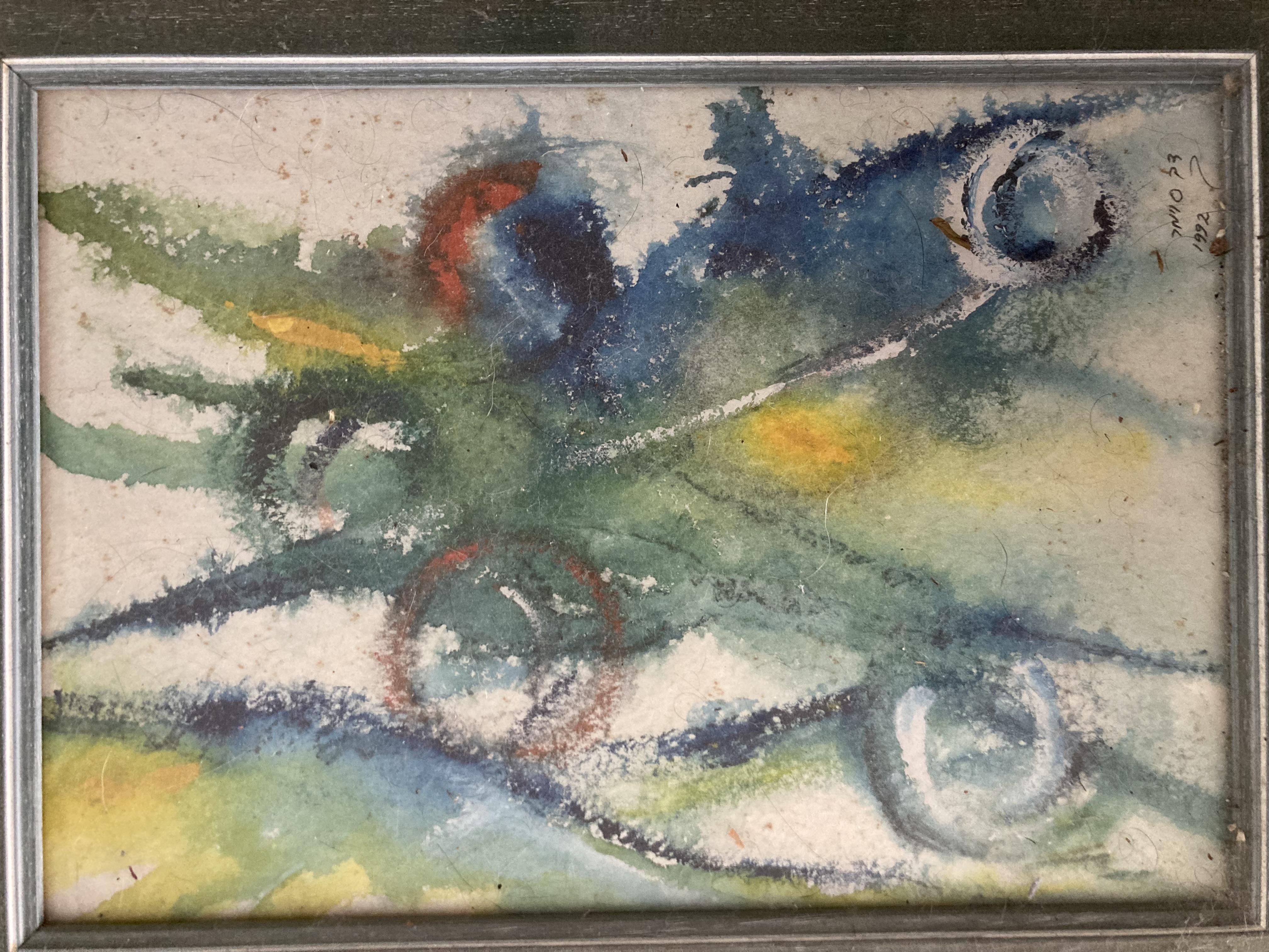 a painting of a bird on a wall