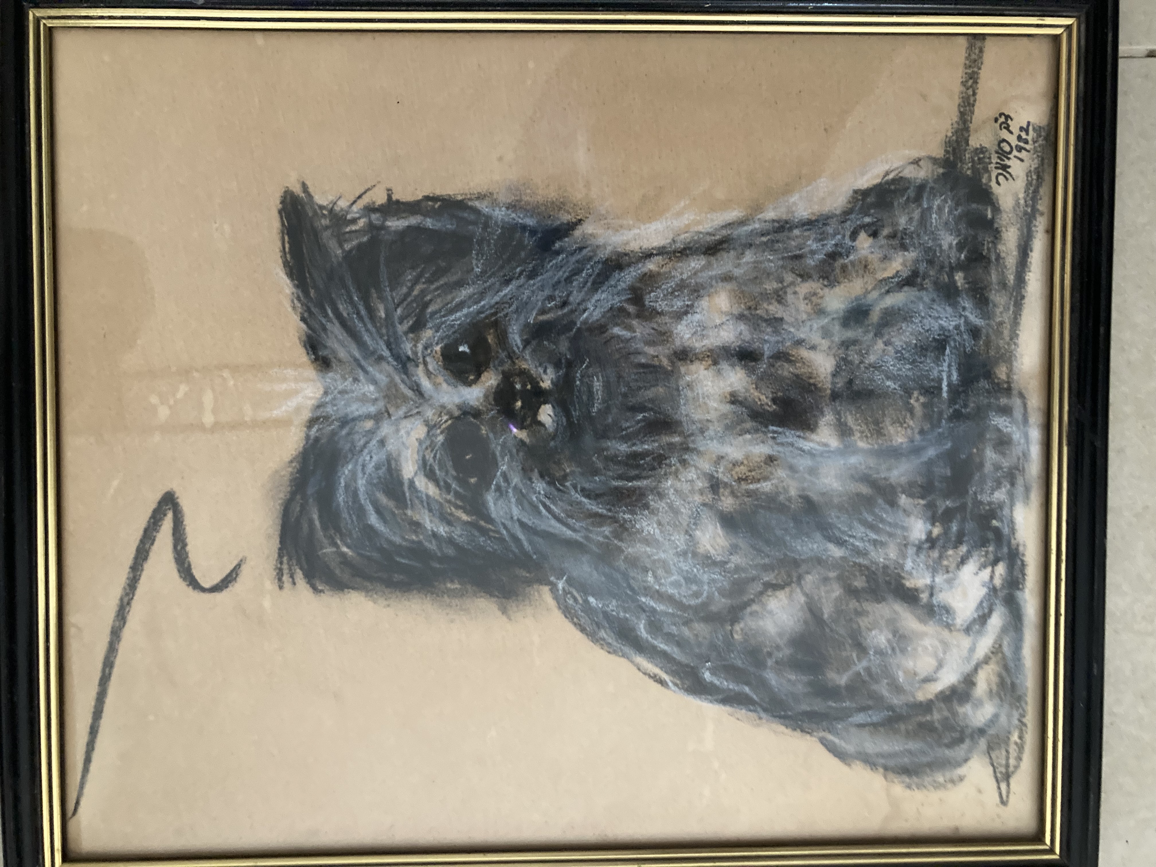 a painting of a cat in a frame