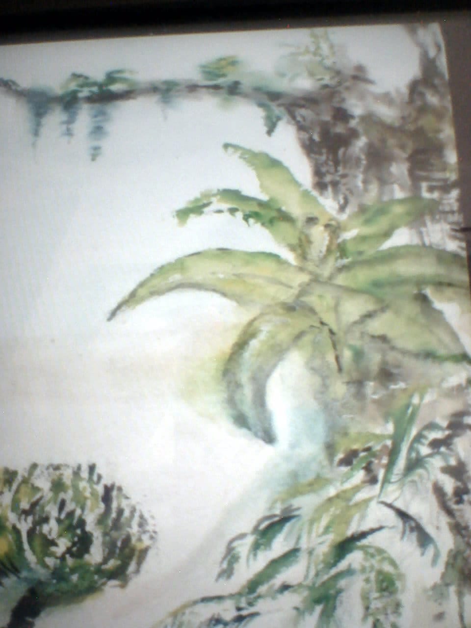 a painting of a plant on a white surface
