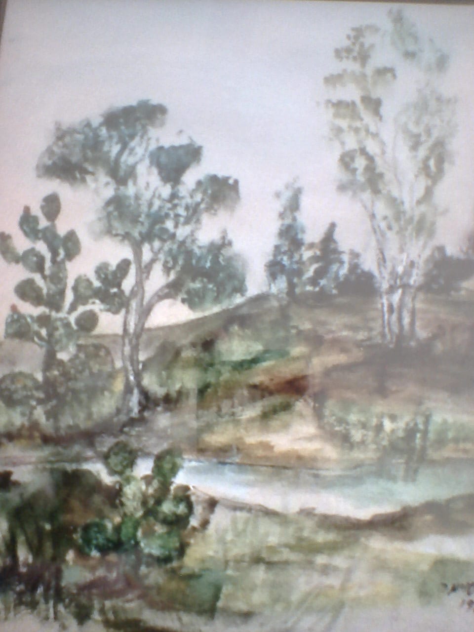 a painting of trees and water in a frame